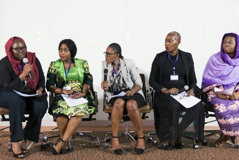 A Group of Business Women Participating in a Panel Discussion