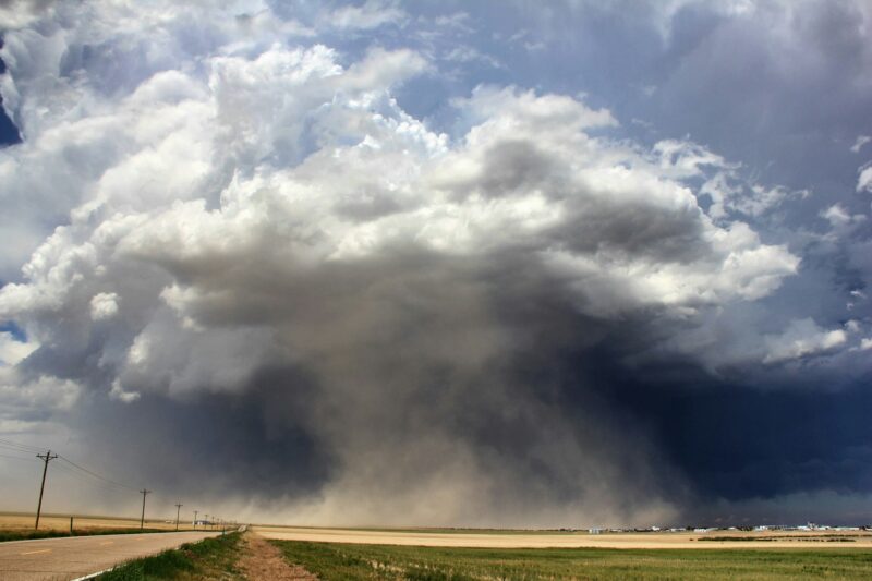 A massive supercell sucks up dust into the updraft leading to a violent dust storm, Sheridan Lake,