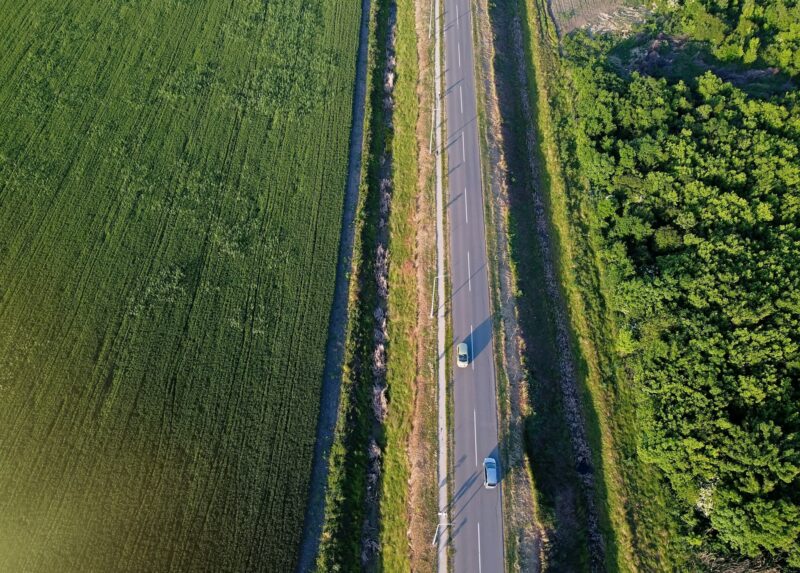 Aerial photography of road and arable crop land for wheat sunflower or corn