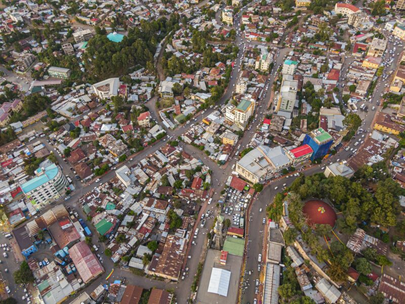 Aerial view of the city centre of Gondar with a lot of car and pedestrian traffic, Ethiopia, Africa