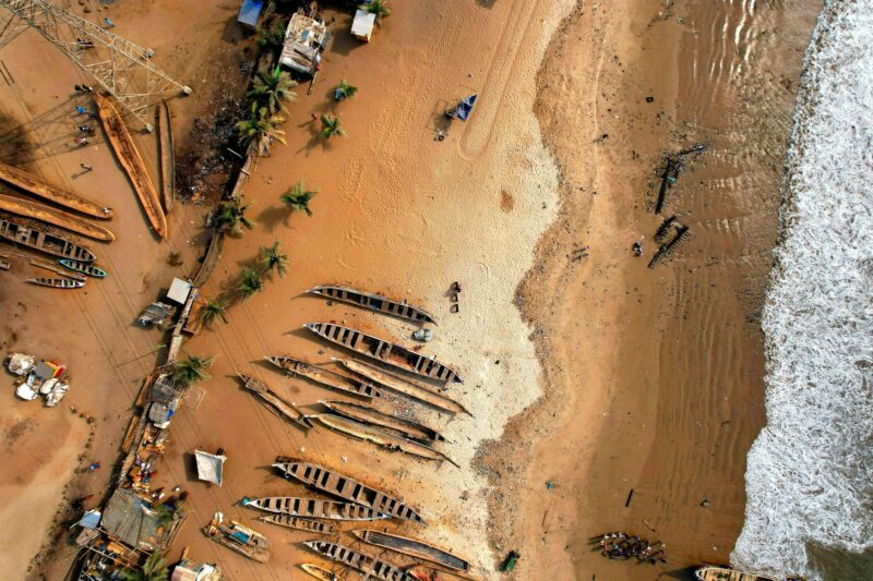 Aerial view of wooden boats at the beach of Tema in Ghana