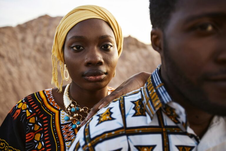 African American Couple Outdoors in Desert with Girl Leaning on Man