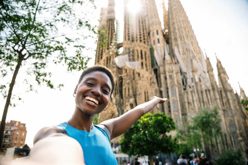 African american woman taking a selfie in Sagrada Familia Church