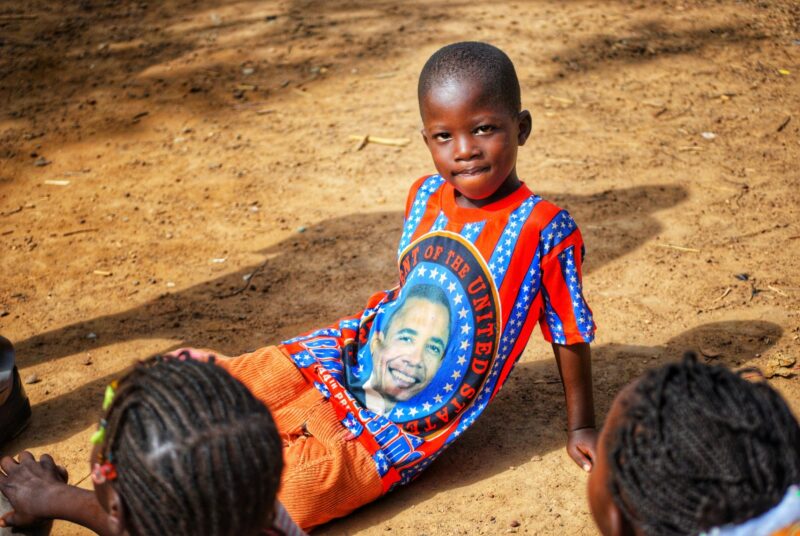 African boy wearing an Obama t-shirt with stars and stripes