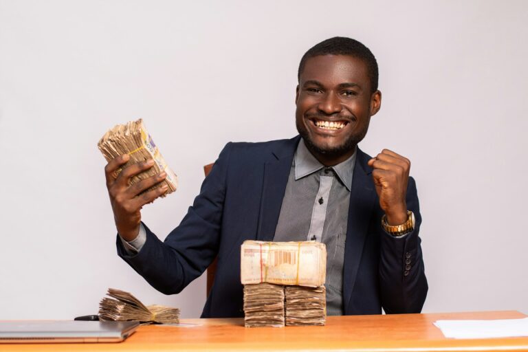 african businessman with lots of money