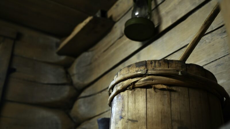 Antique wooden room with vintage items. Media. Inside old wooden house with vintage items. Antique