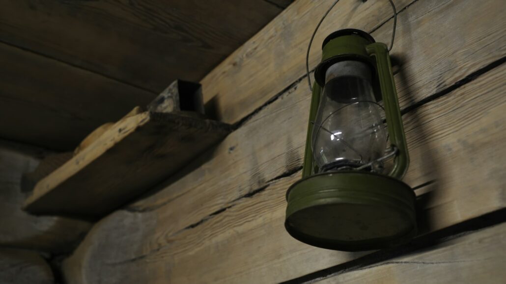 Antique wooden room with vintage items. Media. Inside old wooden house with vintage items. Antique