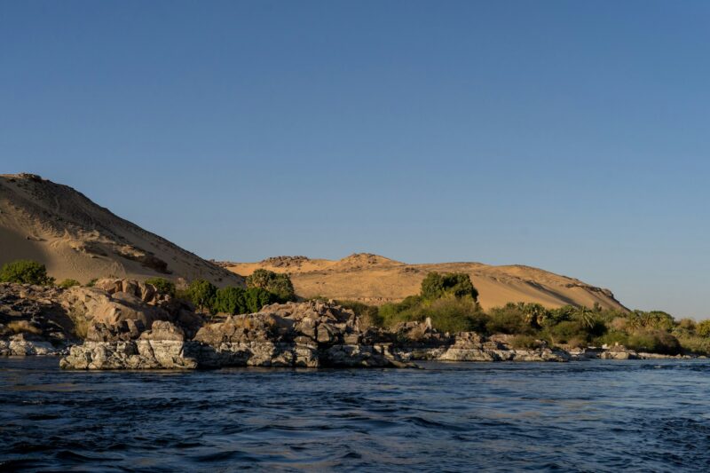 Beautiful landscape of Nile river near the desert on a sunny morning