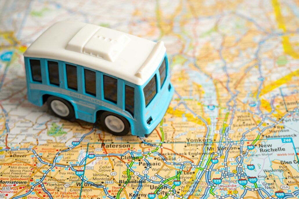 Bus car vehicle to travel on world map, geography, tourism and exploration concept.