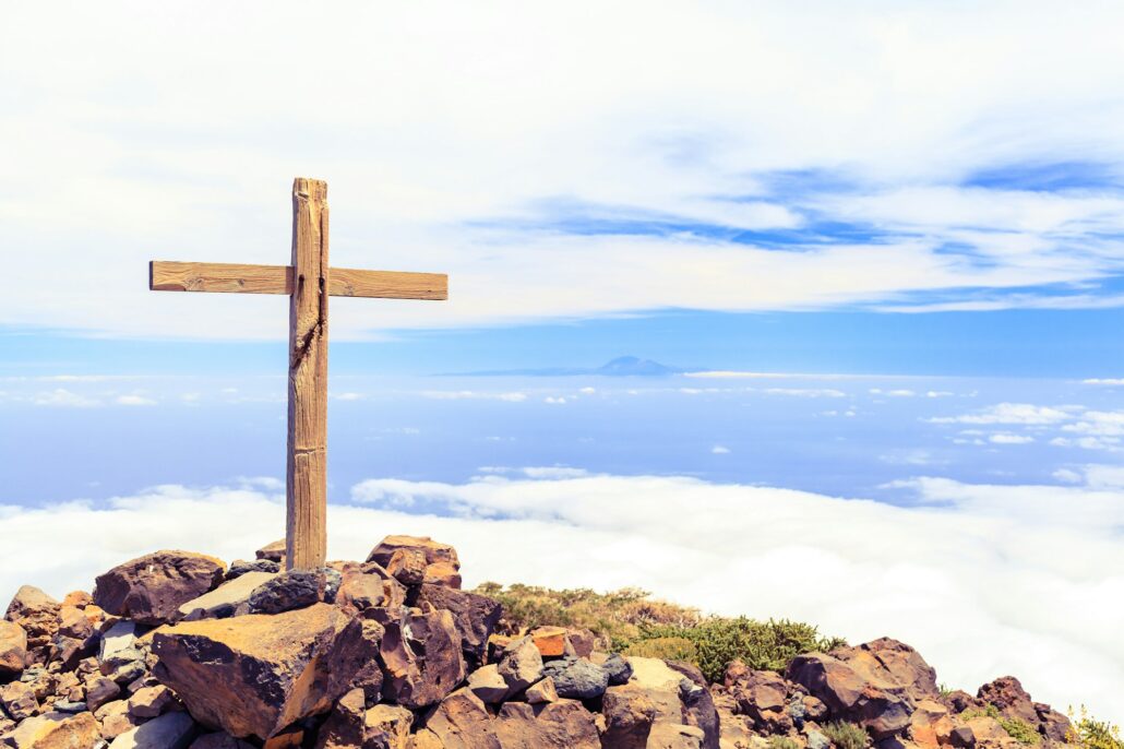 Christian cross on mountain top