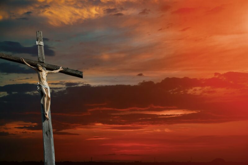 Christian cross on sunset sky religion world christian cross of Jesus Christ