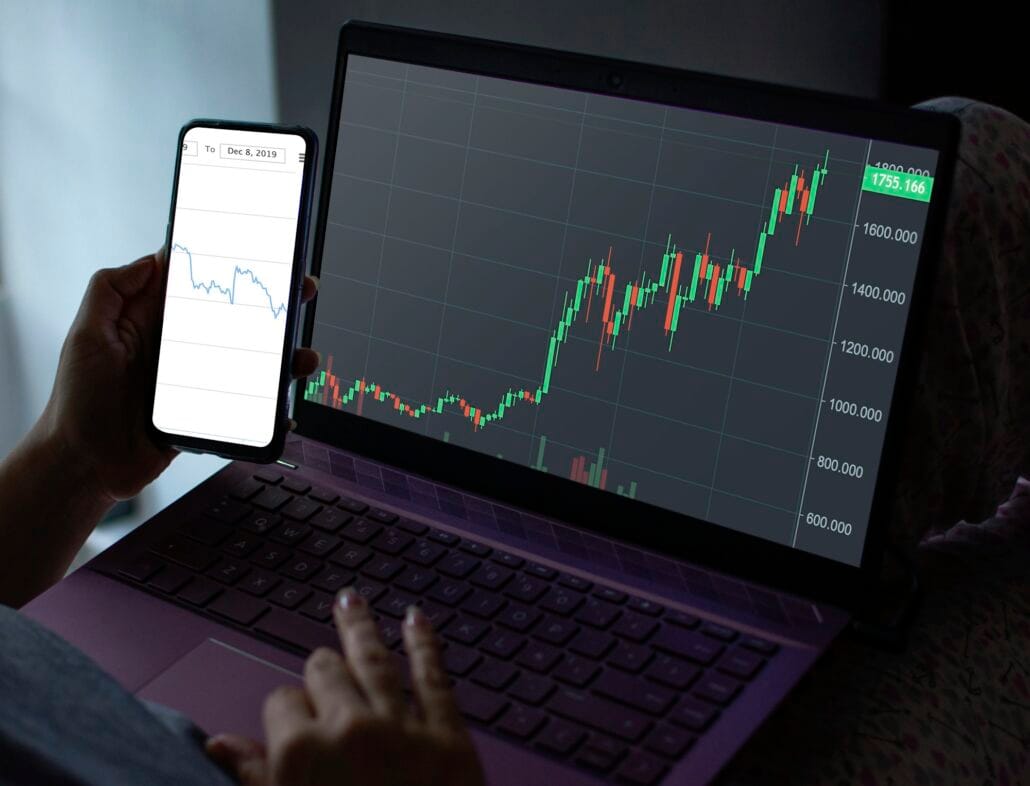 Closeup shot of a young female in the camar reviews her investments in the stock market
