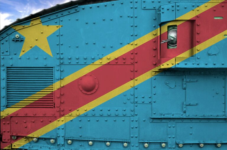 Democratic Republic of the Congo flag depicted on side part of military armored tank close up