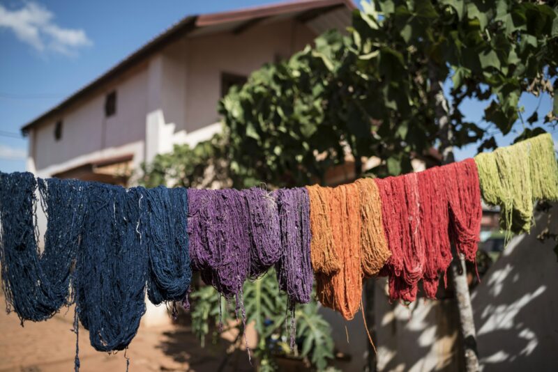 Dyed silk hanging out to dry, Ambalavao, Madagascar Central Highlands