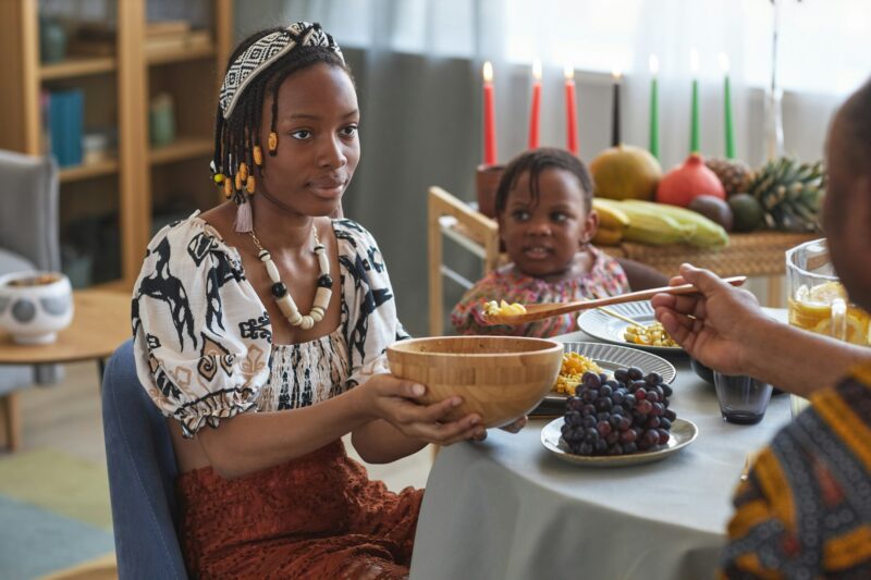 Family eating traditional food at dining table