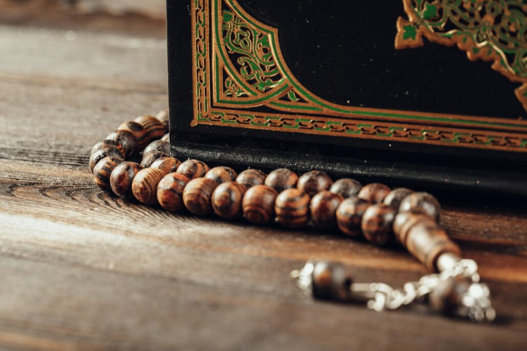 islamic holy book on wooden table
