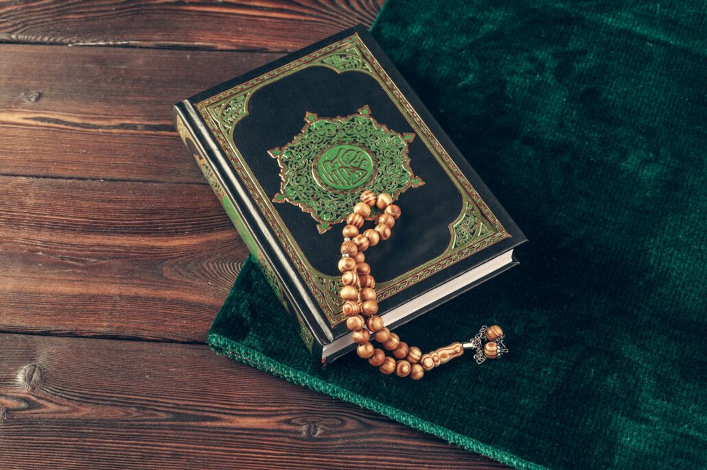 islamic holy book on wooden table