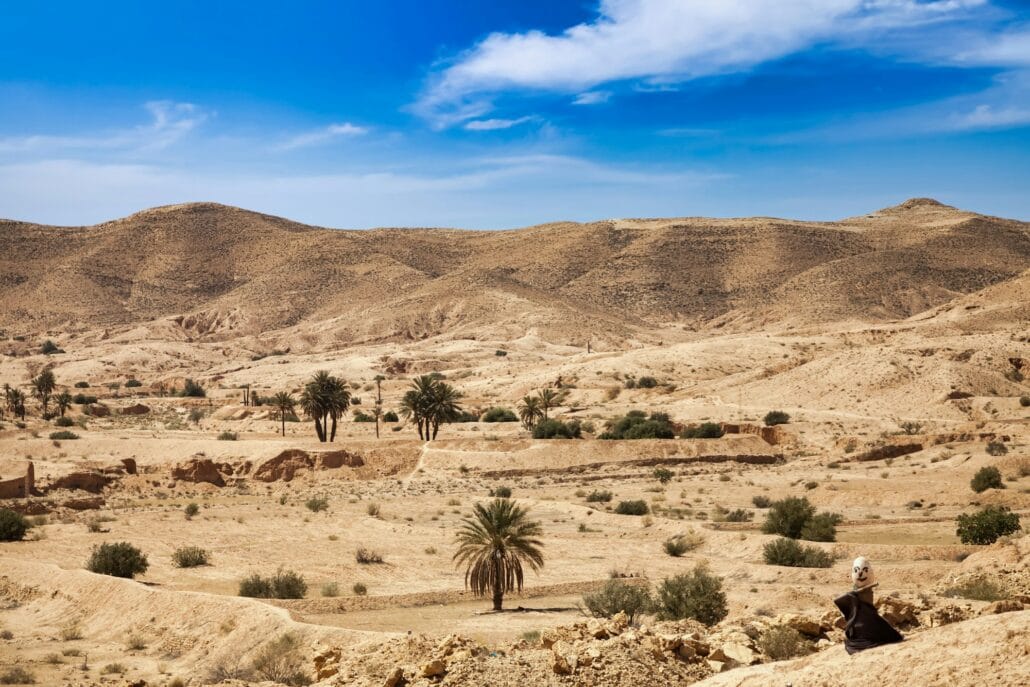 Landscape photography of Sahara desert hills with sand dunes and stones