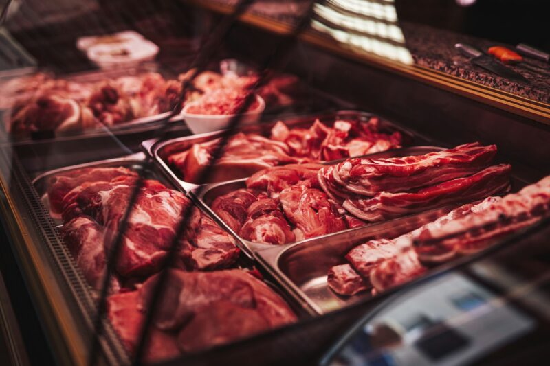 Meat market's fridge with different meat products