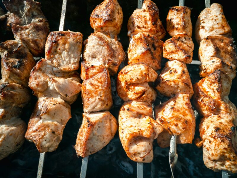 Meat skewers on skewers. Cooking on charcoal grill.