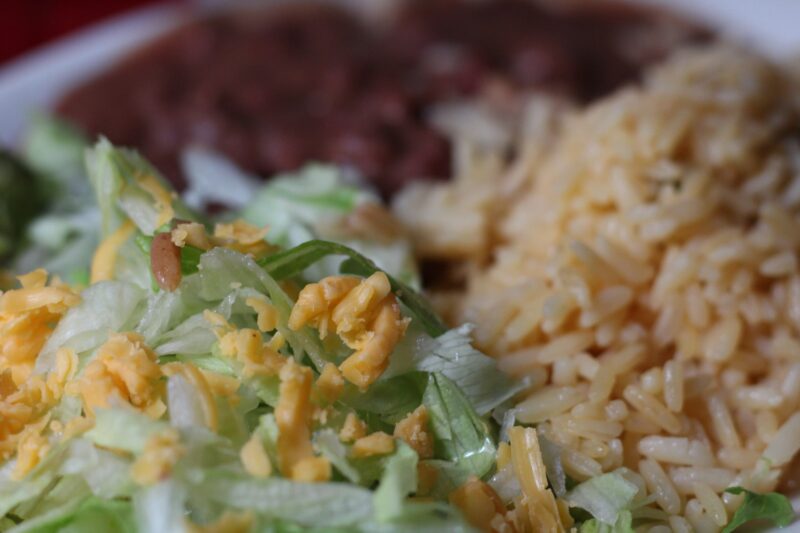 Mexican staple food rice and beans with salad