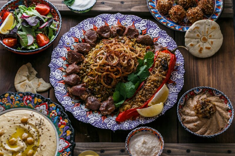 Middle eastern or arabic dishes: shish kebab, falafel, hummus, rice, tahini, kashke bademjan, pita