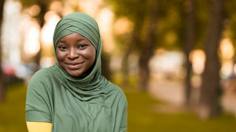 Modern Modesty. Shy Beautiful Black Religious Woman In Hijab Posing Outdoors
