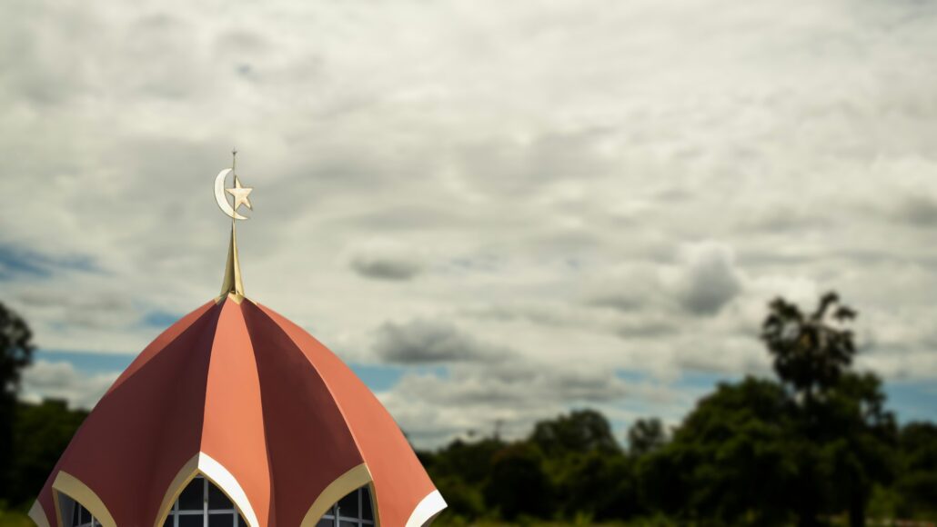 Mosques Dome on Blur Forest and White Cloud Background