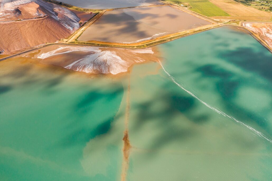 Mountains of products for the production of potash salt and artificial turquoise reservoirs.Salt