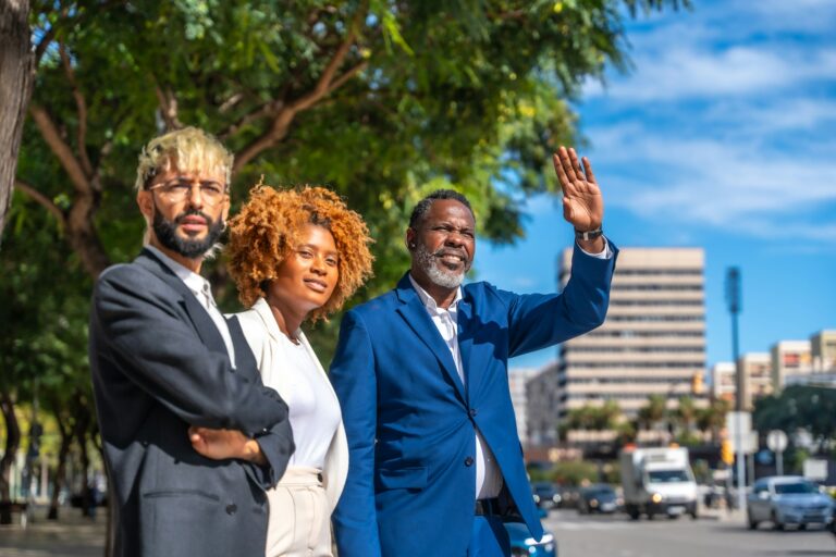 Multi-ethnic business people waiting for a taxi