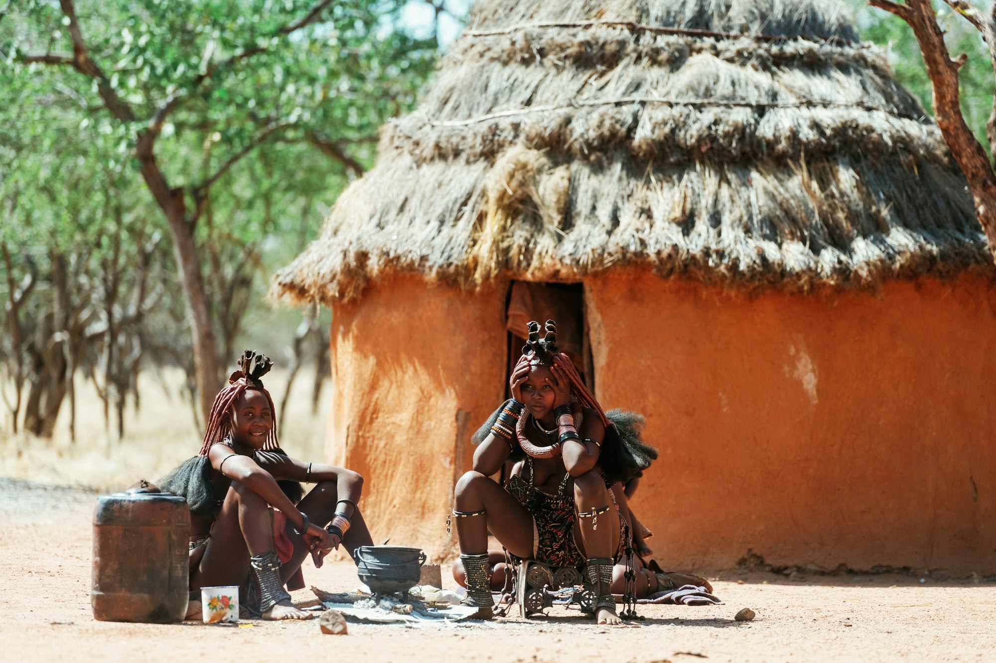 Namibia, Africa - June 14, 2021: Ethnic people, women are together near old styled home
