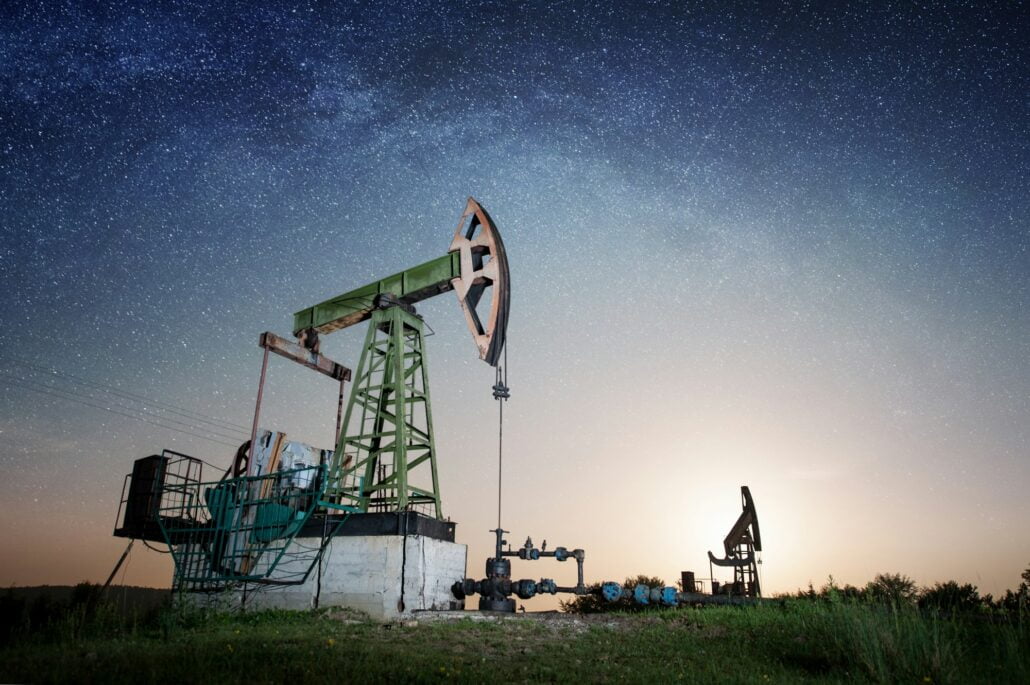 Oil pump on the oil field in the night