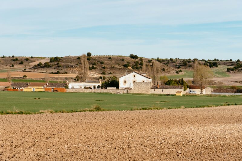 Panoramic view of rural landscape with farm