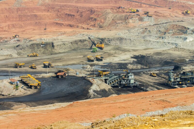 Part of a pit with big mining truck working