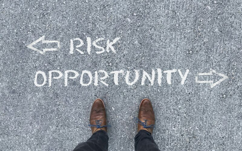 "Risk" and "Opportunity" with arrows pointing to the left and right side
