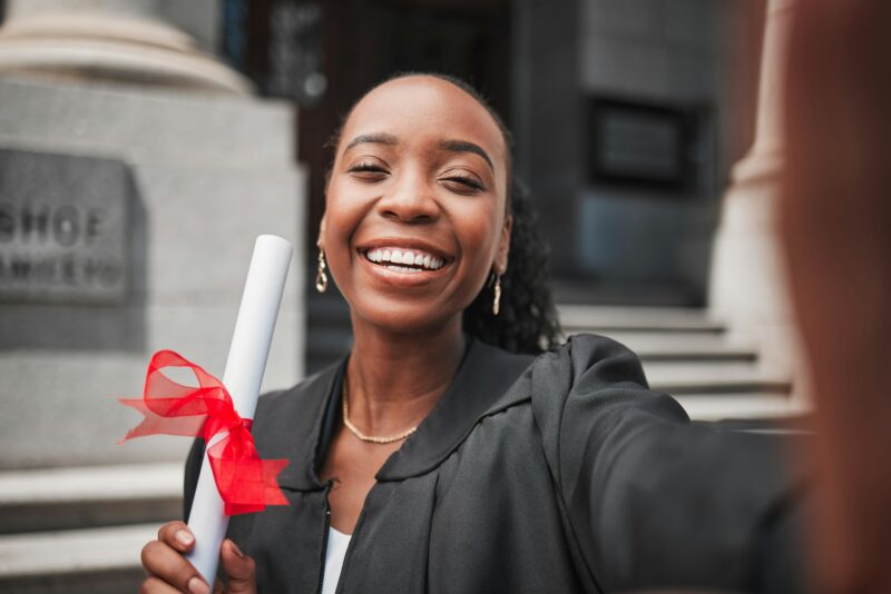 Selfie, black woman and graduation, certificate and celebration memory, university education succes