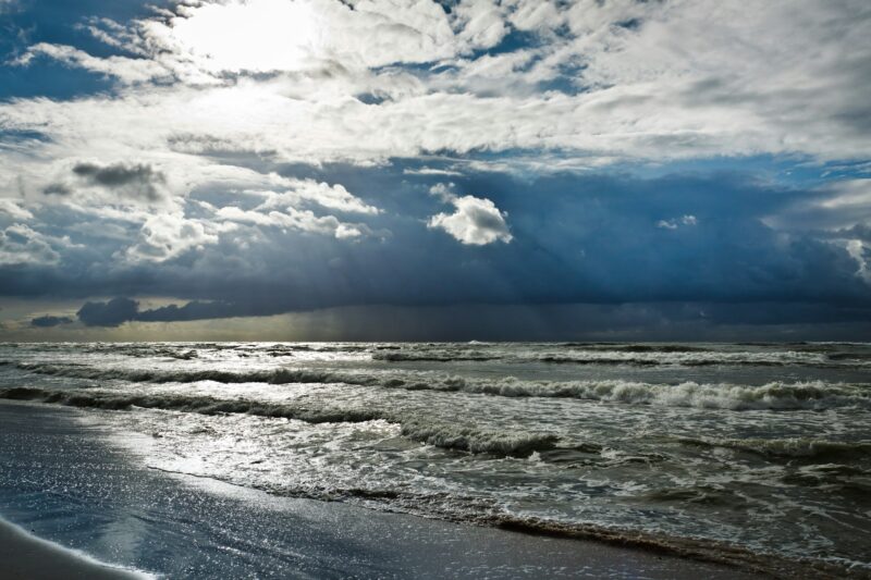 Storm over baltic sea with sunbeam