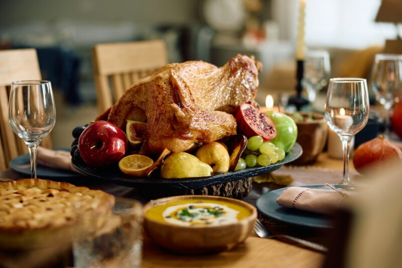 Thanksgiving turkey for holiday meal at dining table.