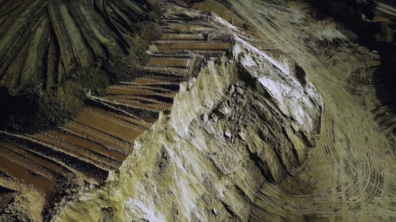 Top view of sand quarry, mining of natural resources or ore, heavy industry concept. Stock footage