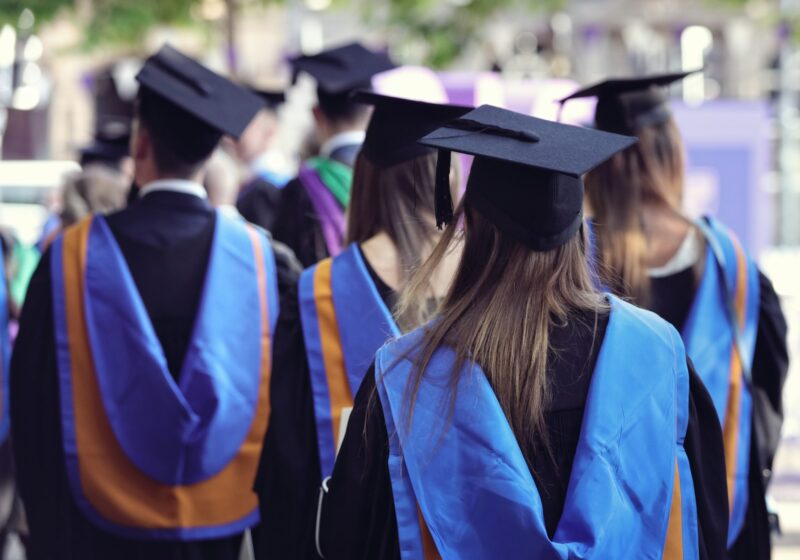 University graduates at graduation ceremony