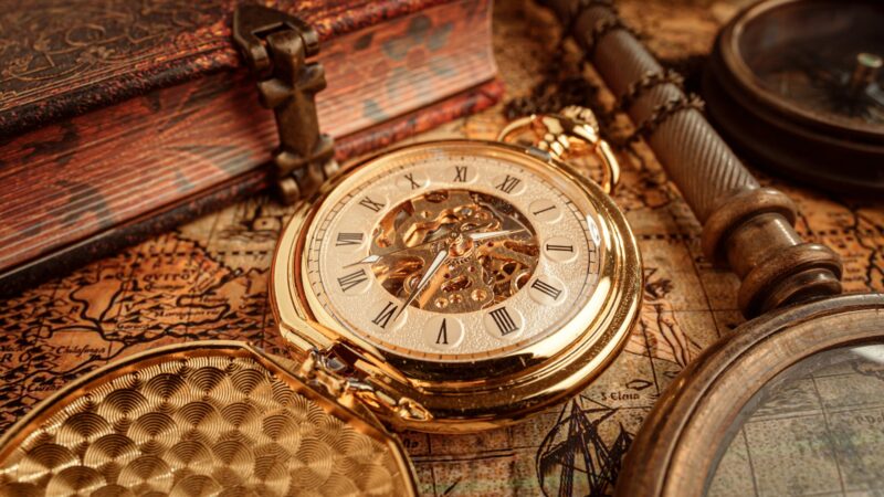 Vintage pocket watch. Vintage background Concept of time history.