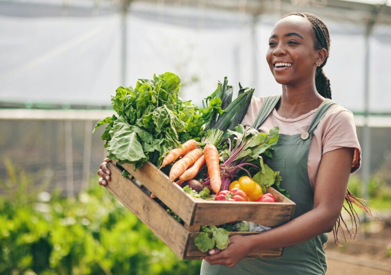 Woman, farming and vegetables in greenhouse for agriculture, supply chain or business with green pr