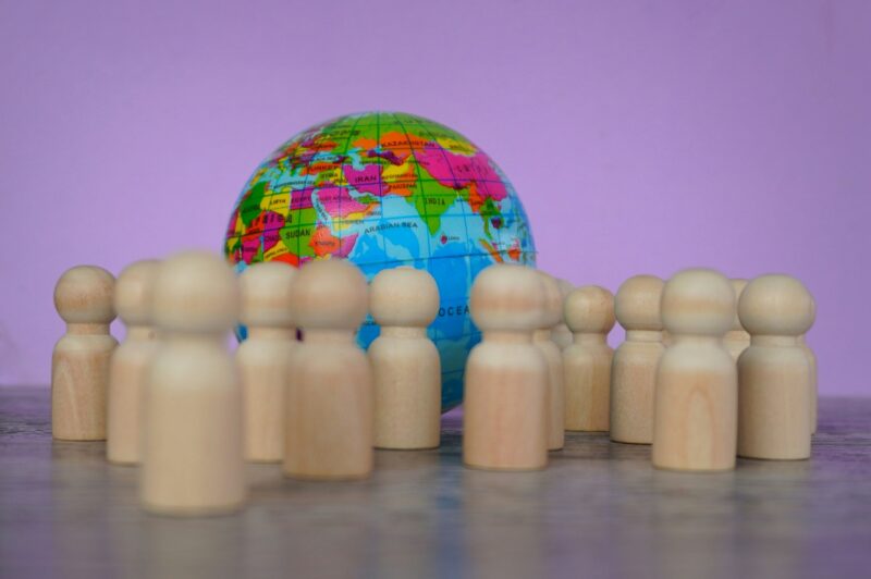Wooden dolls and earth globe.