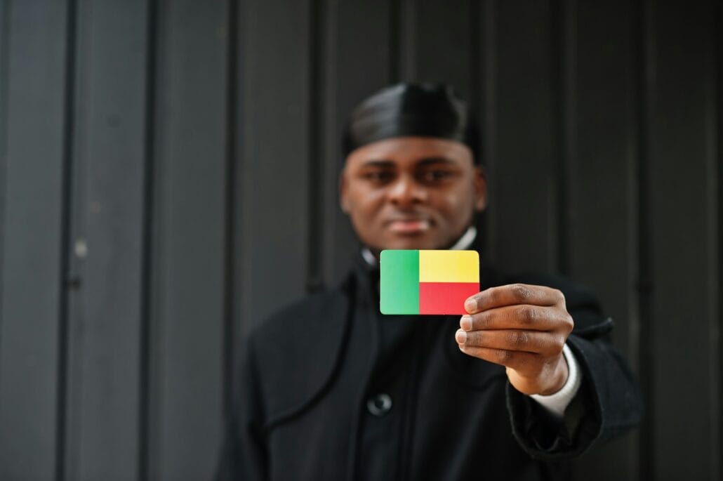 Young african man hold flag