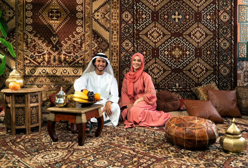 Young couple from Emirati spending time in a cafe