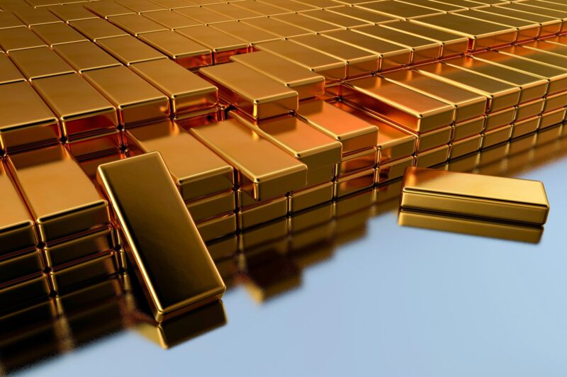 3D illustration of a gold reserve, in the form of gold bars arranged in rows. Large-scale gold