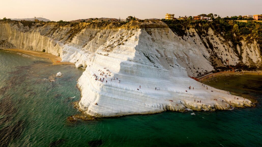 Aerial shot of Scala Dei Turchi crowded with people, San Leone, Turkey
