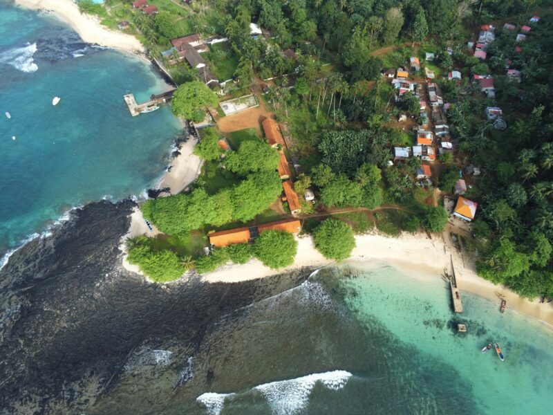 Aerial top view of the tropical Ilheu das Rolas island in Sao Tome, Africa