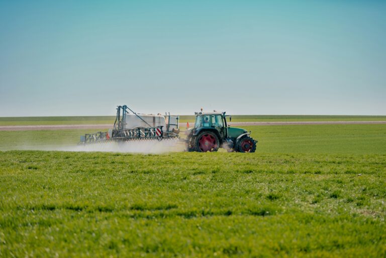 Agriculture Tractor Working in Field