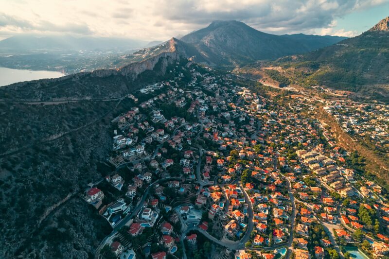 An aerial view of a residential area in the mountains
